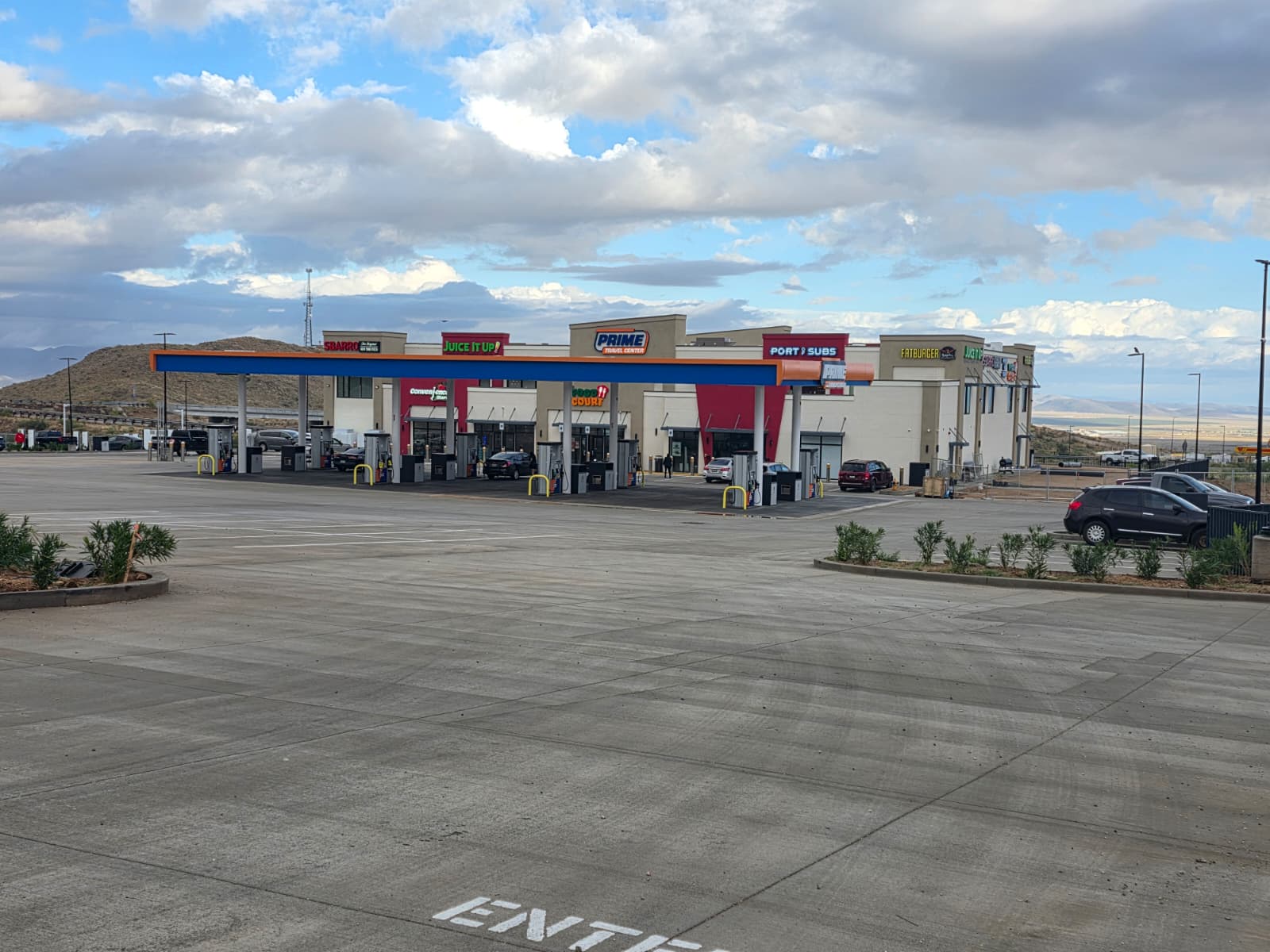 The Prime Travel Center site from the road, with the fuel canopy and store
